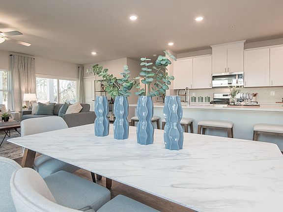 Gather the whole family in the bright and open dining area.