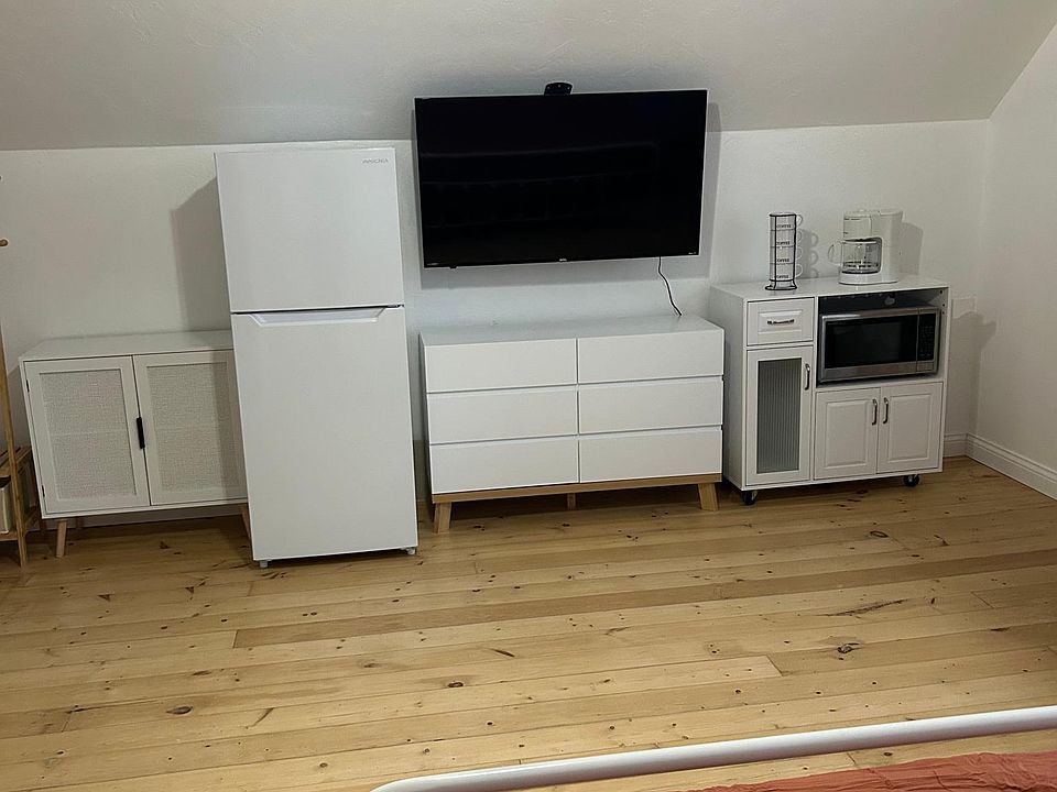 Fridge, 50" Smart Roku TV, Dresser, Hanging Rack, Coffee Station, and Microwave! (you would also have access to a full to the shared kitchen on the first floor)
