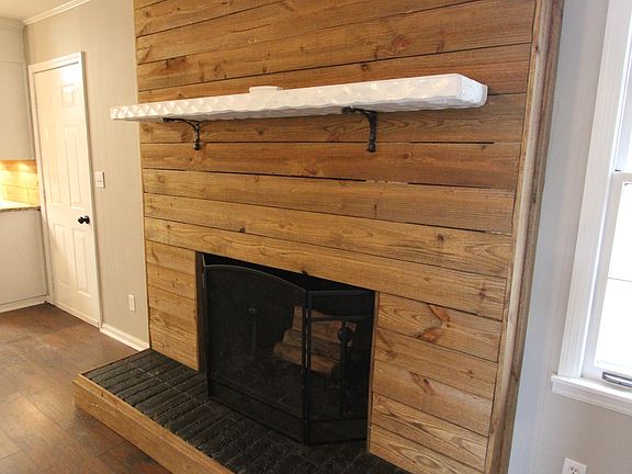Fireplace w/ reclaimed wood