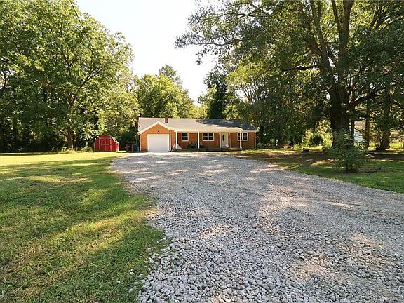 Situated on a one acre parcel in southern Chesapeake, this renovated brick ranch will WOW you the moment you see it!