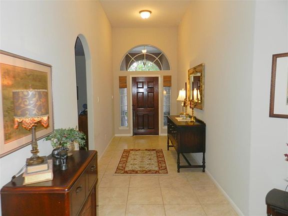 Formal entry with tile flooring.