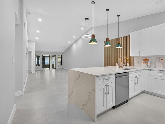 3rd image of 10924 Roebelini Palm Court #A