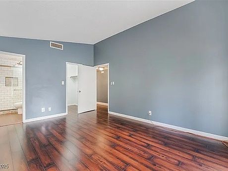 Bedroom 1 looking toward closet and bath