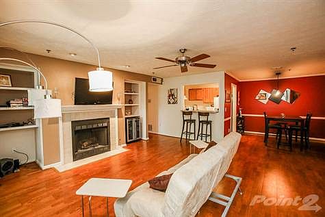 Lovely features include a gas start, wood burning fireplace highlighted by built-in bookcases.