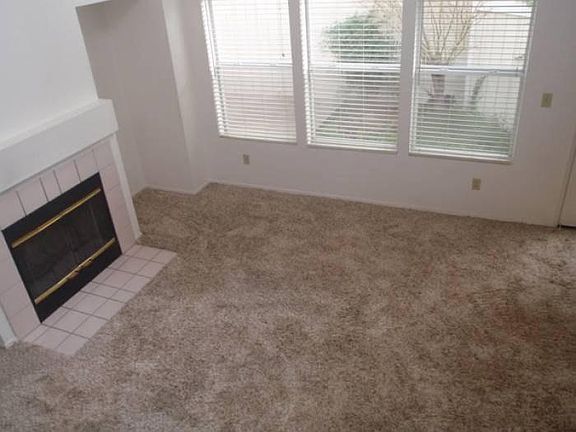 family room with fireplac