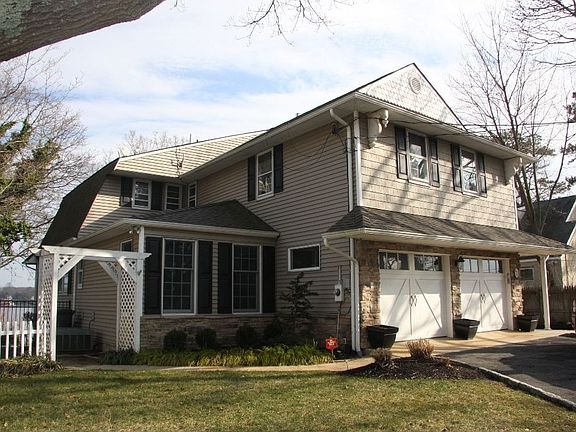 ~Featuring 5 BRs, 3.5 baths, 2 Car Garage, 3 Levels of Living Space, & more!~