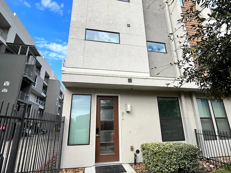 Outside - corner townhome with front yard. Yard maintained weekly by complex management. Smart lock and security camera available.