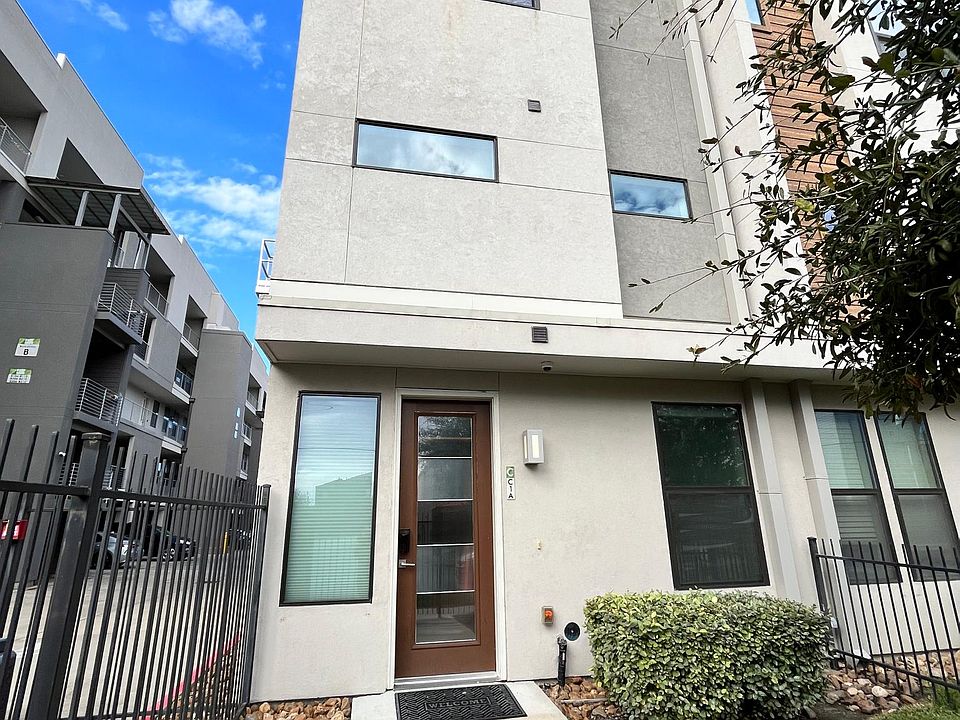 Outside - corner townhome with front yard. Yard maintained weekly by complex management. Smart lock and security camera available.