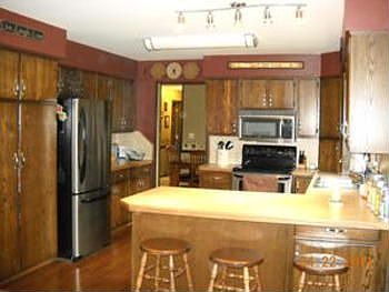 As you walk on thru the dining and living area you'll come thru the spacious kitchen with many cupbo