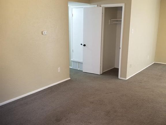 when you enter the front door this is the living room, coat closet and utility closet in the hallway plus part of the dining room.