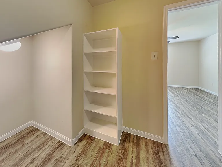 Minimalist corner room with ne