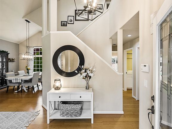 The bamboo flooring and vaulted ceilings with skylights that allow the flood of natural light into this home. 