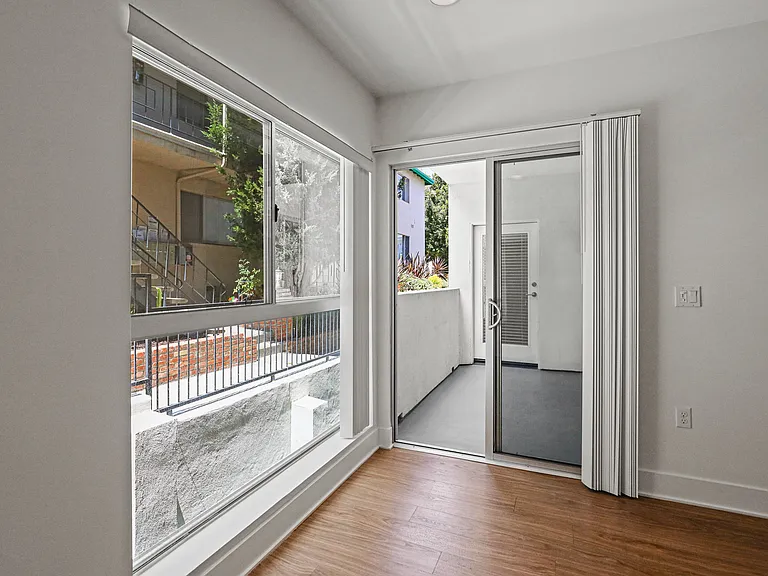 Large Living Room Windows and Spacious Patio