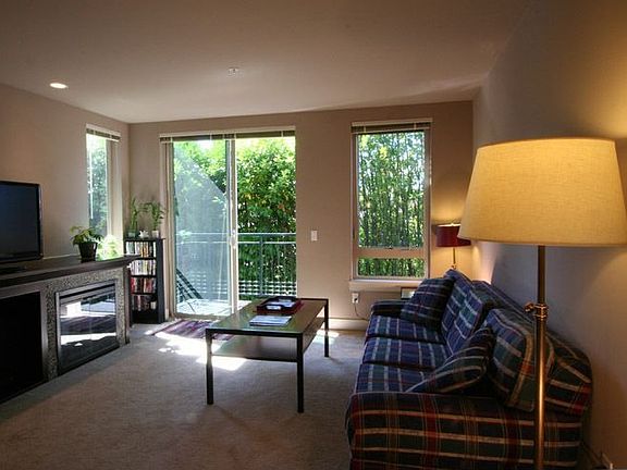 Living area with fireplace, balcony
