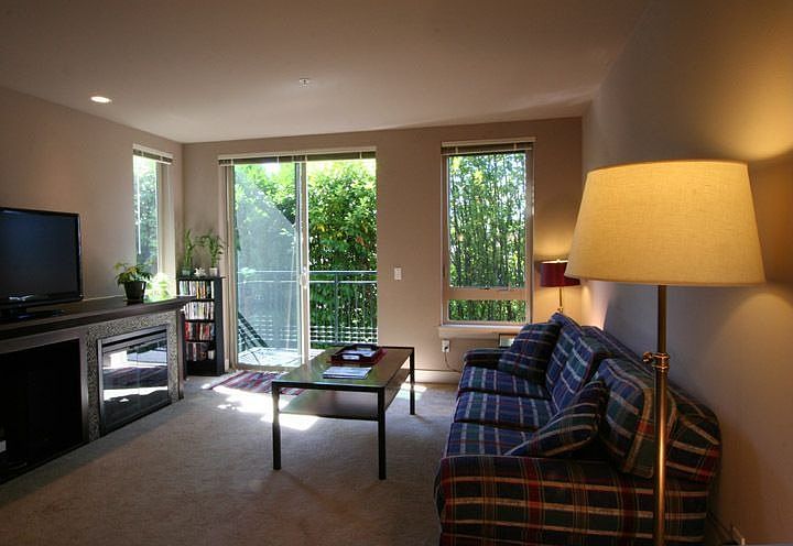 Living area with fireplace, balcony