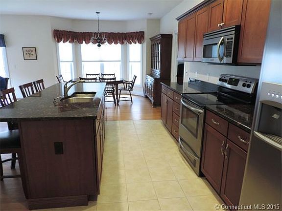 Kitchen looks into dining room