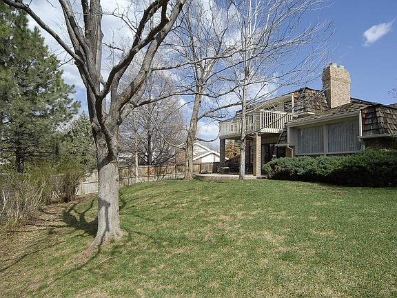 Backyard w/ Master Bedroom Balcony