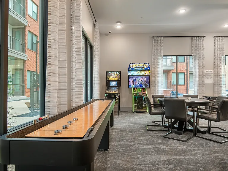 Game Room With Billiards Table And Games