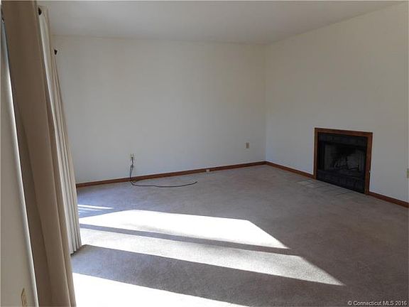Living room with fireplace.