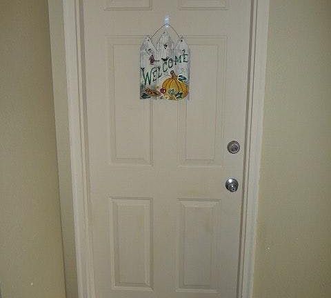 Entry door into condo