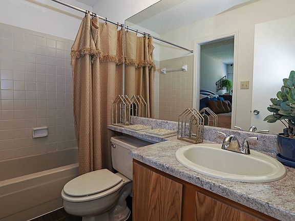 Clean and well-maintained bathroom with updated fixtures and ample counter space