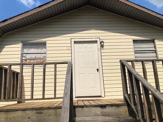 Upstairs entrance shown. There is also an internal stairwell accessed via bedroom 2.