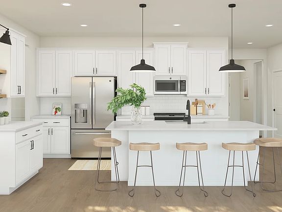 Kitchen with pendant lighting and center island