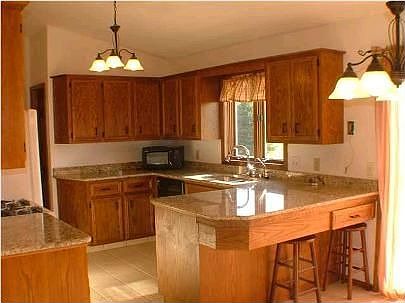 Kitchen sink with window overlooking the country view