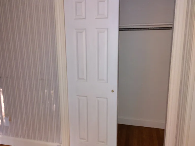 Front room, potential additional bedroom showing closet.