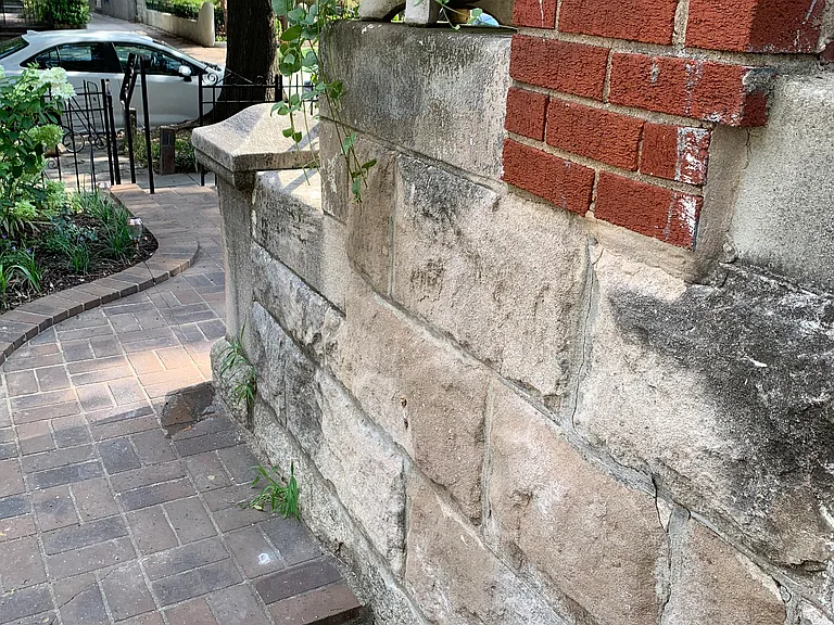 View of stairs down to apartment