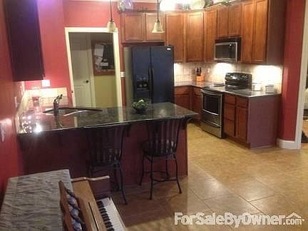 Huge Eat-In Kitchen
						:
						Granite countertops and abundant lighting