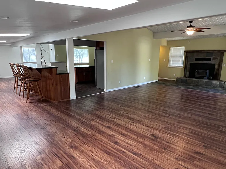 Living room looking to the kitchen / dining area