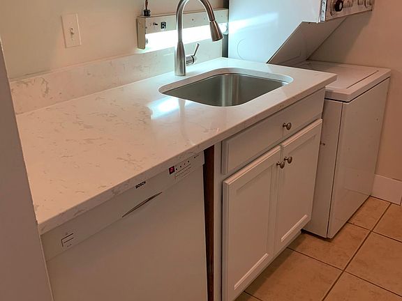 Kitchen with new cabinets and new granite countertops.