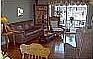 From dining room into living room overlooking private courtyard.