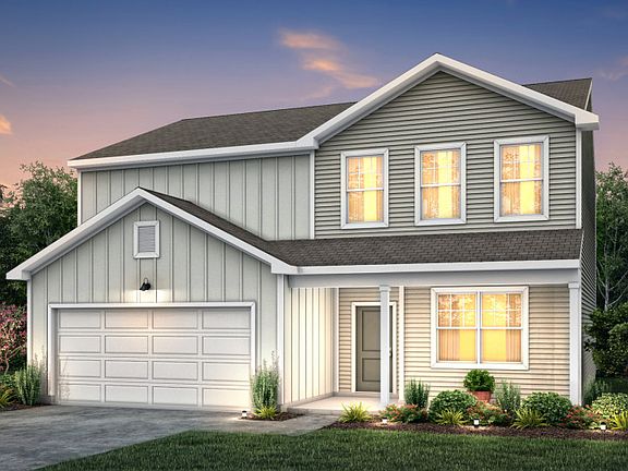 Rosella Exterior TD102 features siding, covered front porch and 2 car garage
