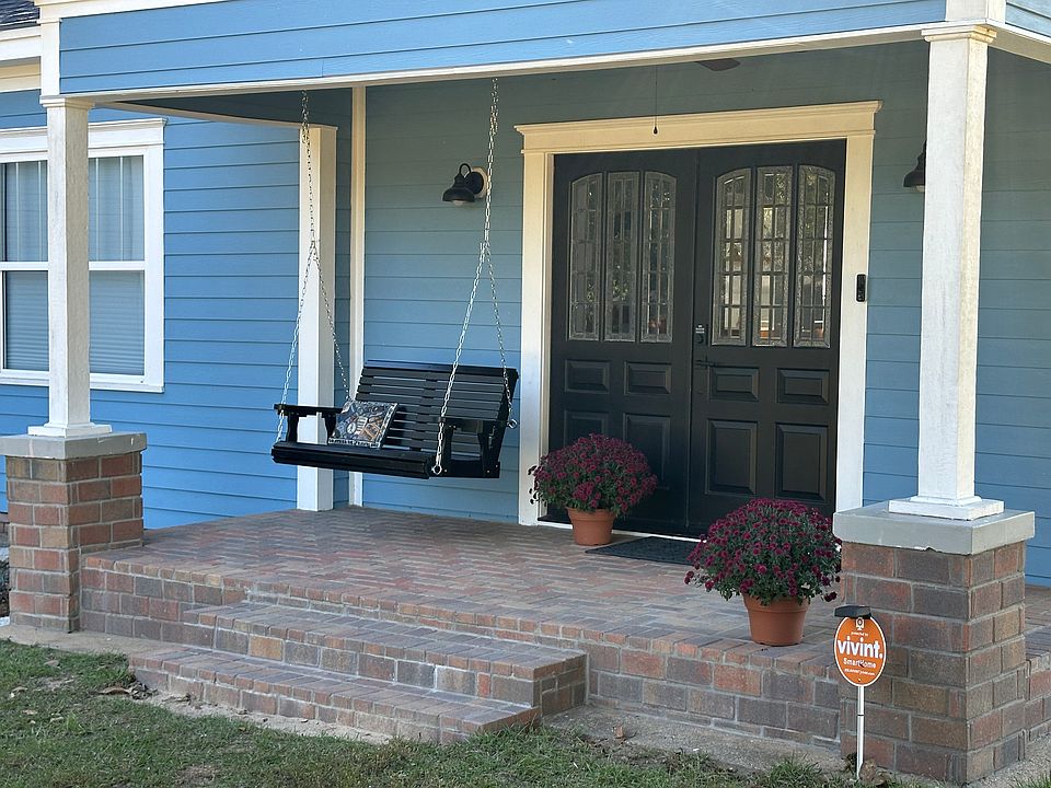 Front entry, have a cup of coffee and enjoy the swing.