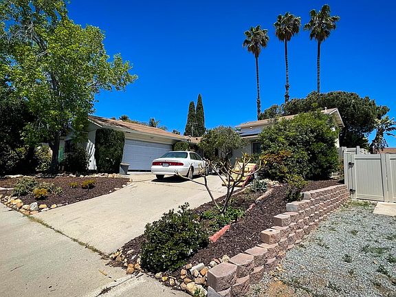 The Front house - Parking in the driveway, 2 story apartment in the back.