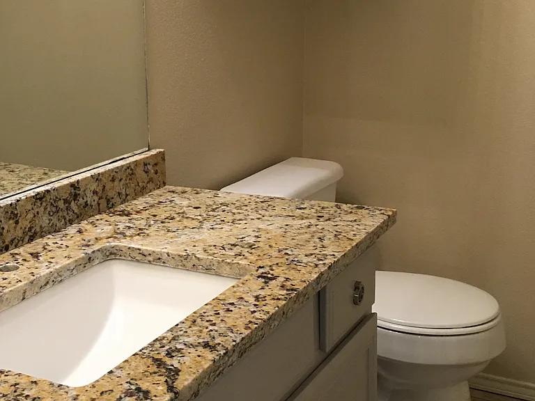 Upstairs bath with new cabinet, sink, and counter*