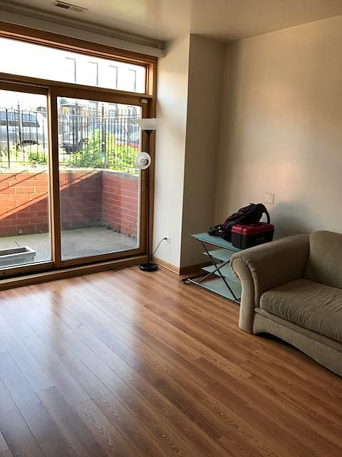 Living room, access to a spacious front patio.