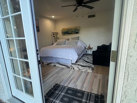 Private entrance with garden view French doors and personalized keypad entry