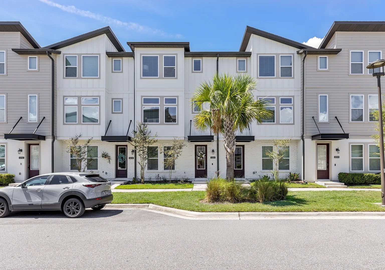 Upgraded 3BR/3.5BA Laureate Park Townhome | 2-Car Garage + EV Charging — Photo 1