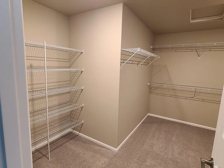 Oversized Walk in Closet inside Master bathroom entrance