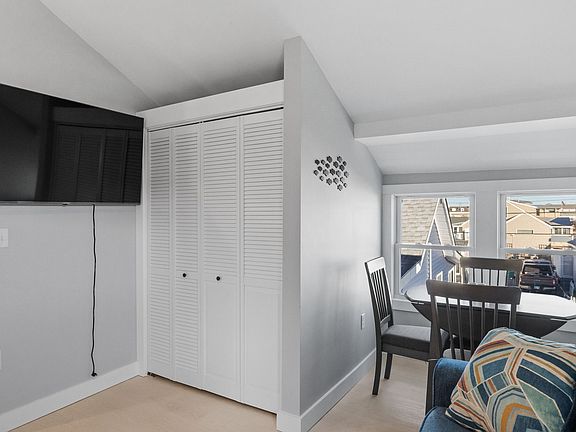 Closet to hang jackets, as well as a dining space for 4.