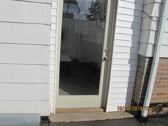 FRONT OF BREEZEWAY ENTRANCE