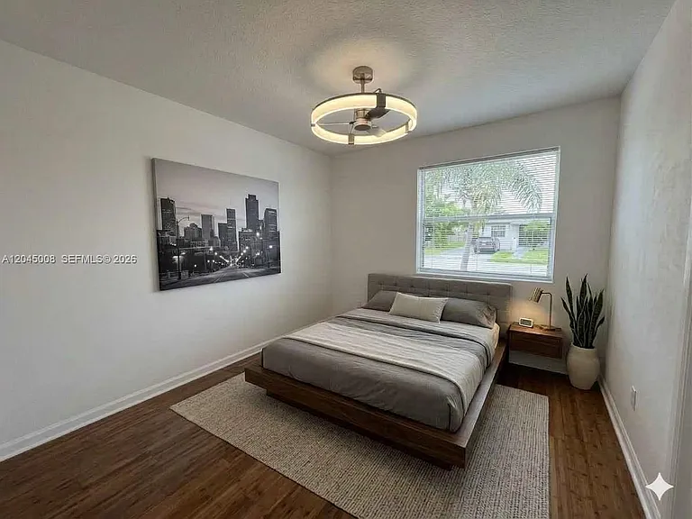 7720 Raleigh St — Photo 11