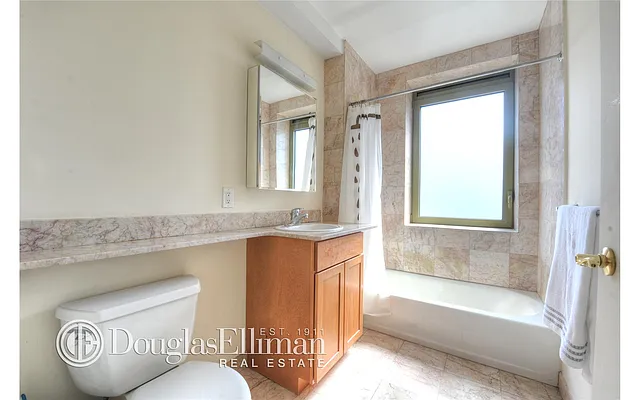 Sold by Douglas Elliman | media 11
