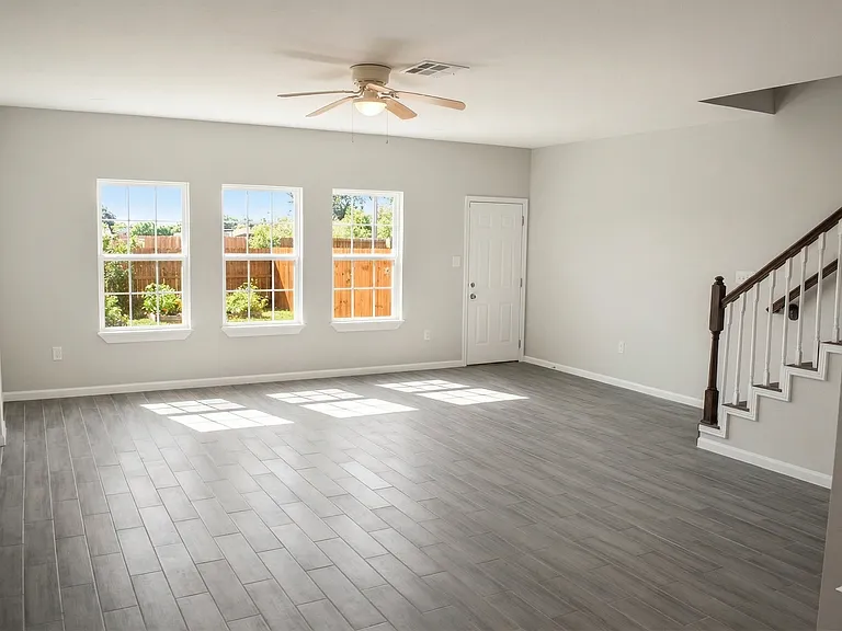 Living room with door to back yard.