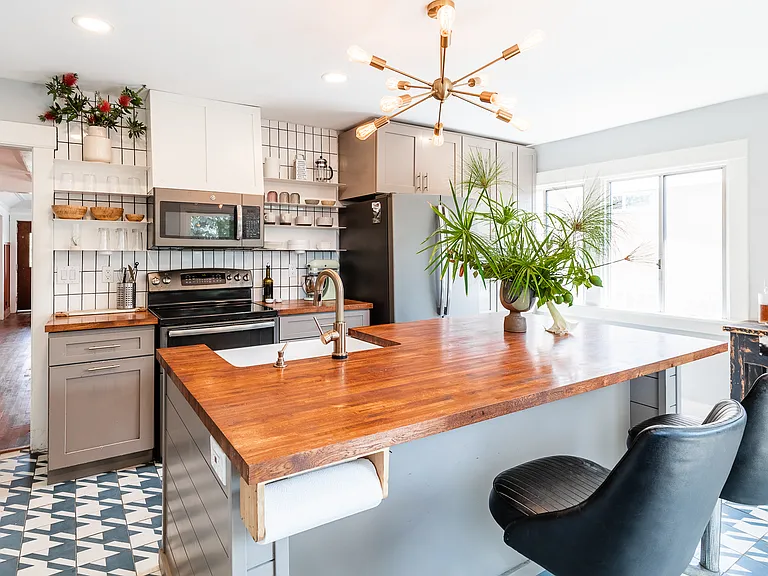 Remodeled Kitchen. The refrigerator has been replaced with a brand-new stainless steel.