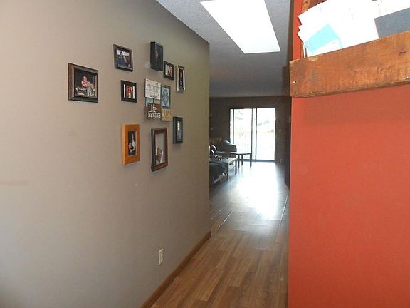 Laminate wood flooring throughout living areas.