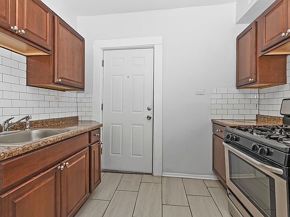 3rd image of 6100-6108 S Eberhart Ave #6100-3E